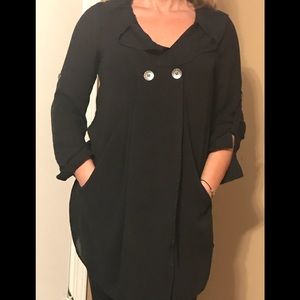 Cute black top, worn a few times, super trendy